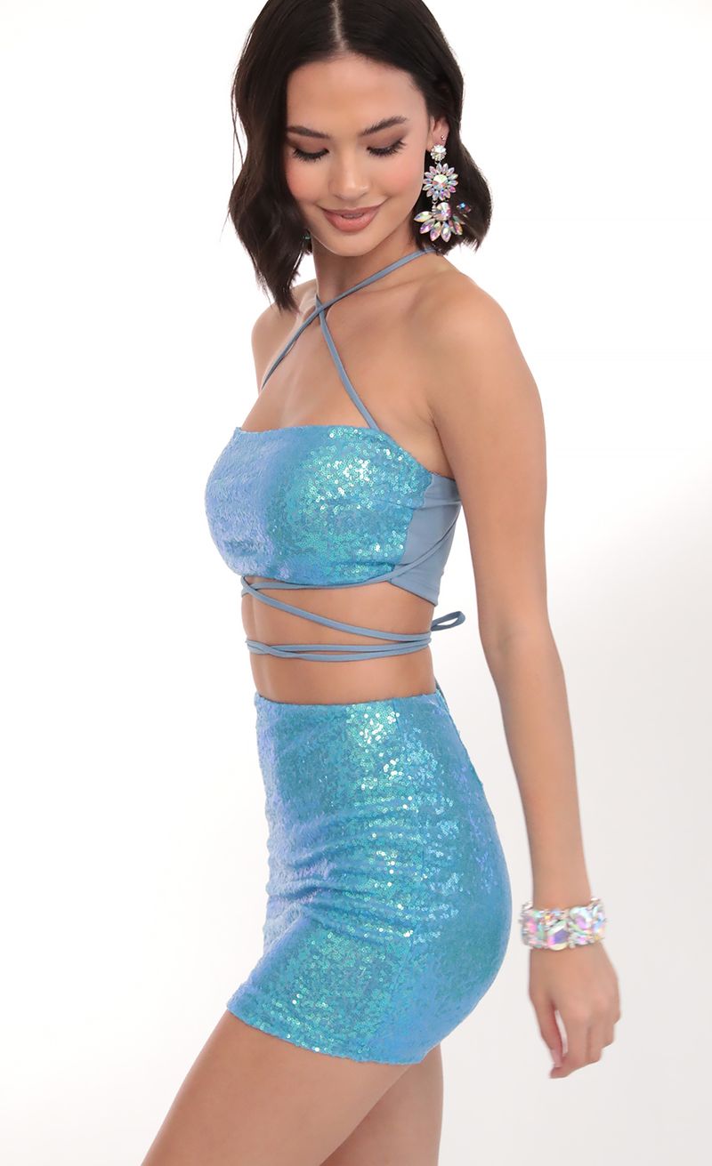 Picture Eva Iridescent Sequin Set in Blue. Source: https://media.lucyinthesky.com/data/Mar20_2/800xAUTO/781A0414.JPG