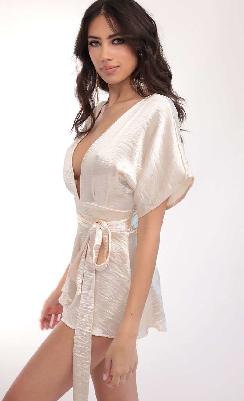 Picture Feeling The Night Satin Romper in Creme Brulee. Source: https://media.lucyinthesky.com/data/Mar20_2/800xAUTO/781A5545.JPG