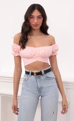 Picture Mariana Pink Ruched Wrap Top. Source: https://media.lucyinthesky.com/data/Mar21_2/150xAUTO/1V9A4191.JPG