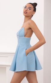 Picture thumb Babette Pleated Dress in Gingham Blue. Source: https://media.lucyinthesky.com/data/Mar21_2/170xAUTO/1V9A4092.JPG