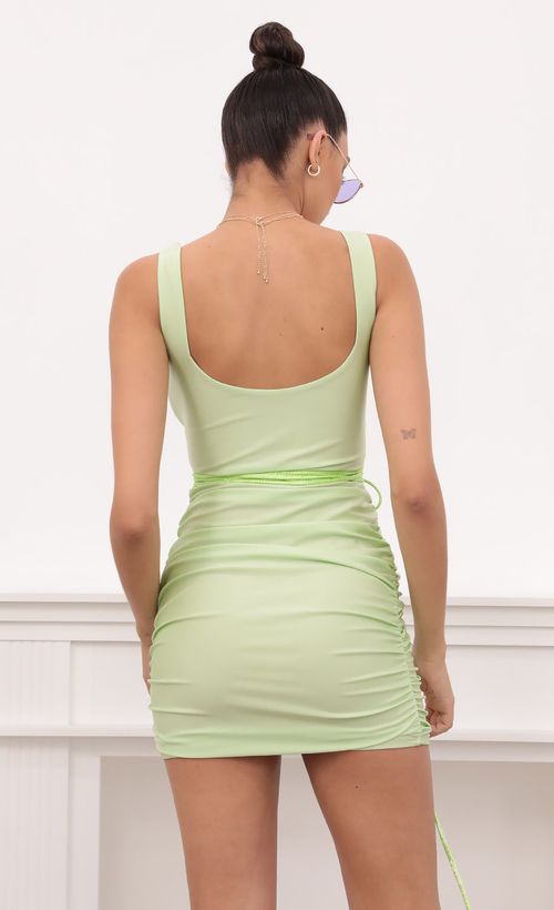 Picture Kim Front Tie Ruched Dress in Lime Green. Source: https://media.lucyinthesky.com/data/Mar21_2/500xAUTO/1V9A2157.JPG