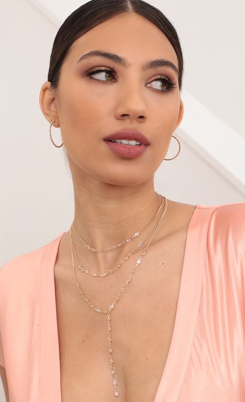 Picture Three Layer Crystal Necklace and Lariat Set. Source: https://media.lucyinthesky.com/data/Mar21_2/500xAUTO/AT2A1593_COPY_LARGER.JPG