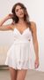 Picture Shelby Ruffle Baby Doll Romper in White. Source: https://media.lucyinthesky.com/data/Mar21_2/50x90/1V9A4380.JPG
