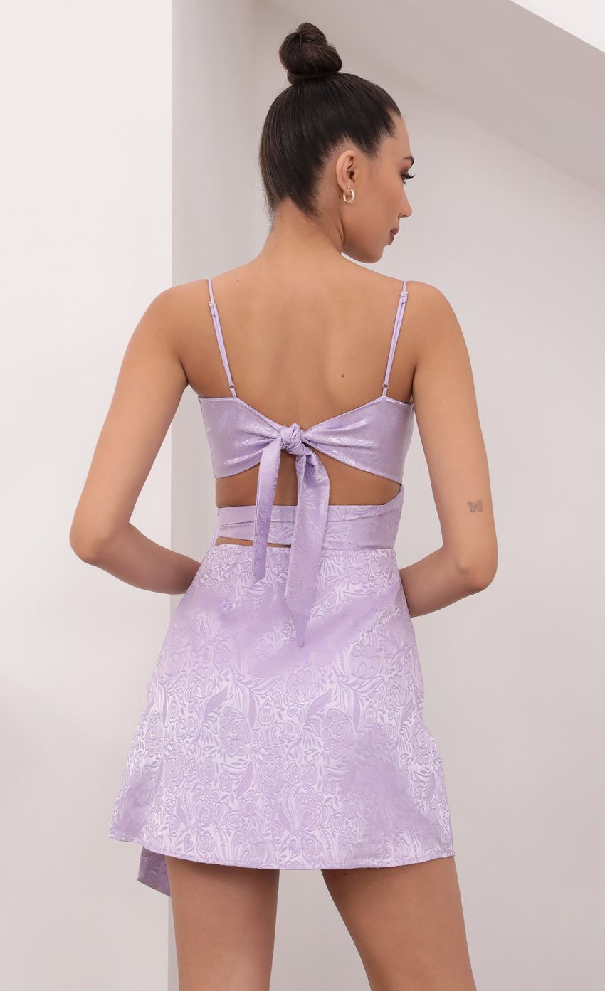 Picture Betsy Cutout Tie Dress Jacquard Lavender. Source: https://media.lucyinthesky.com/data/Mar21_2/850xAUTO/1V9A7783.JPG