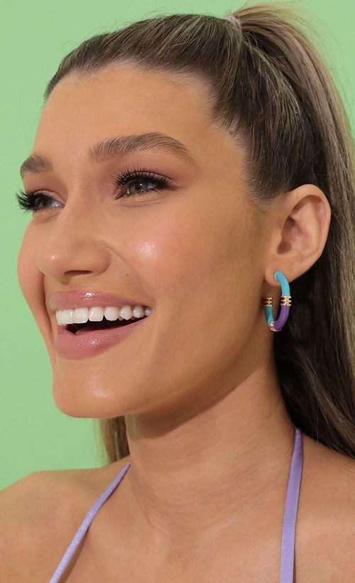 Picture Green Goddess Hoop Earrings in Blue and Purple. Source: https://media.lucyinthesky.com/data/Mar22_1/500xAUTO/1V9A04641.JPG