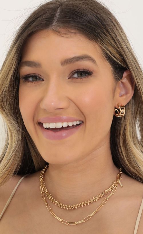 Picture Queen B Earring Hoop in Gold. Source: https://media.lucyinthesky.com/data/Mar22_1/500xAUTO/1V9A52191.JPG