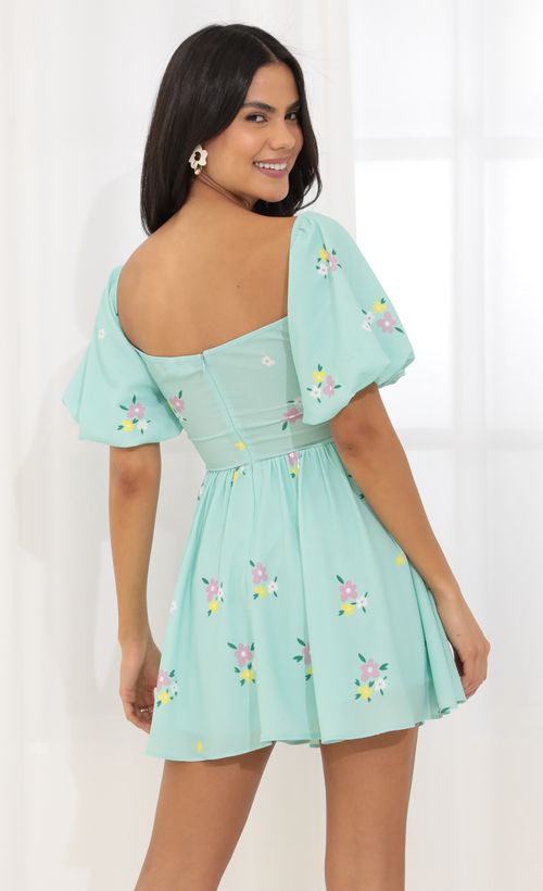 Picture Jess Tummy Cutout Dress in Turquoise. Source: https://media.lucyinthesky.com/data/Mar22_2/500xAUTO/1V9A2466.JPG