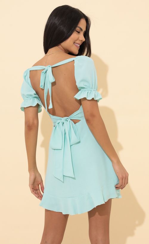 Picture Alice Fit and Flare Dress in Turquoise. Source: https://media.lucyinthesky.com/data/Mar22_2/500xAUTO/1V9A4300.JPG