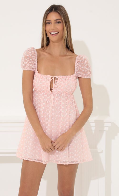 Picture Odessa Baby Doll Dress in Floral Peach. Source: https://media.lucyinthesky.com/data/Mar22_2/500xAUTO/1V9A4585.JPG