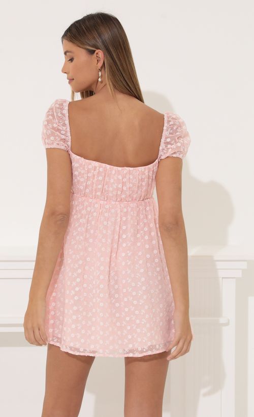 Picture Odessa Baby Doll Dress in Floral Peach. Source: https://media.lucyinthesky.com/data/Mar22_2/500xAUTO/1V9A4687.JPG