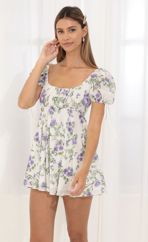 Picture Leilani Printed Chiffon Baby Doll Dress in White and Purple. Source: https://media.lucyinthesky.com/data/Mar22_2/500xAUTO/1V9A8476.JPG