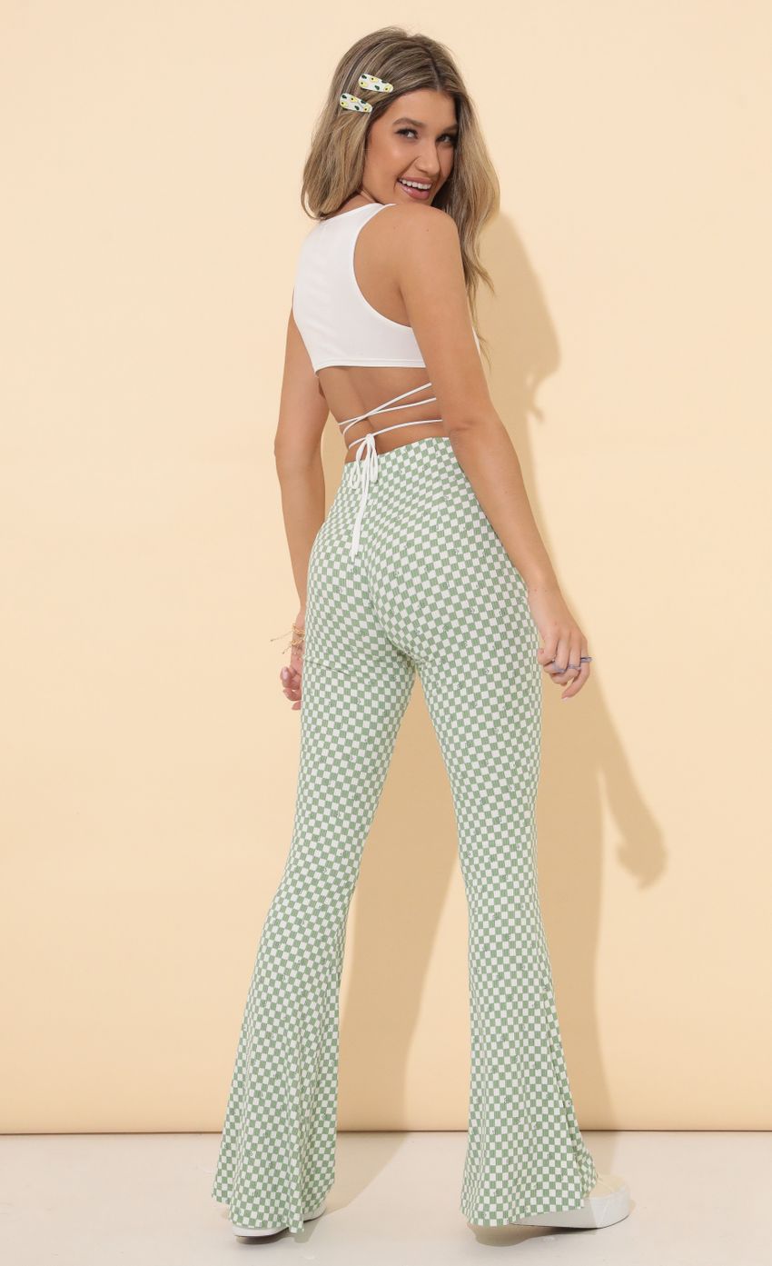 Picture Oaklynn Pant in Checkered Green Multi. Source: https://media.lucyinthesky.com/data/Mar22_2/850xAUTO/1V9A7610.JPG