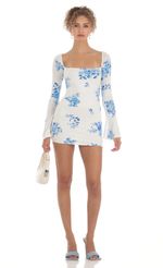 Picture Paola Floral Long Sleeve Dress in Blue. Source: https://media.lucyinthesky.com/data/Mar23/150xAUTO/a21170b0-4f23-4336-8528-0d631e16c8bc.jpg