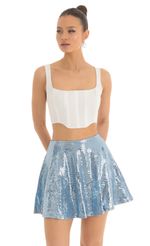 Picture Jasmin Sequin Square Skirt in Blue. Source: https://media.lucyinthesky.com/data/Mar23/150xAUTO/e5a42327-4332-4066-b5c7-5f88126fffd6.jpg