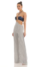 Picture thumb Renae Sequin Halter Striped Jumpsuit in White and Navy. Source: https://media.lucyinthesky.com/data/Mar23/170xAUTO/262fd256-a36c-4e7c-9ece-00c85646e336.jpg