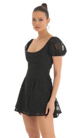 Picture thumb Wannda Floral Puff Sleeve Dress in Black. Source: https://media.lucyinthesky.com/data/Mar23/170xAUTO/4bdf4aff-d38d-4851-94aa-5235c1a052d2.jpg