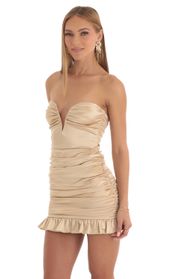 Picture thumb Ravena Ruched Strapless Dress in Gold. Source: https://media.lucyinthesky.com/data/Mar23/170xAUTO/51154d55-2cc0-42af-9f49-c486428f0057.jpg