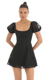 Picture thumb Wannda Floral Puff Sleeve Dress in Black. Source: https://media.lucyinthesky.com/data/Mar23/170xAUTO/638f1627-6fd5-4fa7-9e6c-c3626fe6fde9.jpg