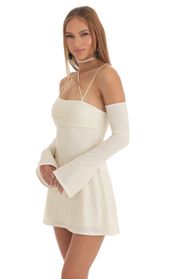 Picture thumb Viv Glitter Strappy Party Dress in White. Source: https://media.lucyinthesky.com/data/Mar23/170xAUTO/66297ae1-5d1b-4161-a0b6-283ea5311f99.jpg