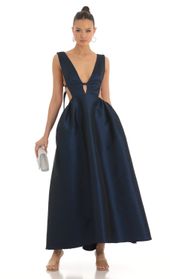 Picture thumb Priya Plunge Maxi Dress in Navy. Source: https://media.lucyinthesky.com/data/Mar23/170xAUTO/6c58c2d7-da9d-4ec9-b625-ec0c5f778589.jpg