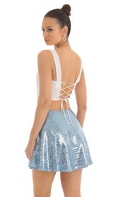 Picture thumb Jasmin Sequin Square Skirt in Blue. Source: https://media.lucyinthesky.com/data/Mar23/170xAUTO/6d9d8642-5358-41d4-a264-bd821d6fc649.jpg