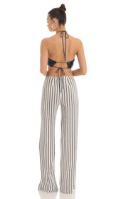 Picture thumb Renae Sequin Halter Striped Jumpsuit in White and Navy. Source: https://media.lucyinthesky.com/data/Mar23/170xAUTO/7765bdaa-16db-442d-a980-22988a828891.jpg