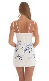 Picture thumb Dorian Floral Cutout Dress in Blue and White. Source: https://media.lucyinthesky.com/data/Mar23/170xAUTO/85286e49-9580-460f-8a62-32fc5ba1c2f4.jpg