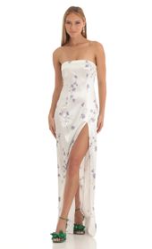 Picture thumb Nicholya Satin Floral Maxi Dress in White. Source: https://media.lucyinthesky.com/data/Mar23/170xAUTO/c0987182-4b21-460c-9c61-1295e3a12d82.jpg