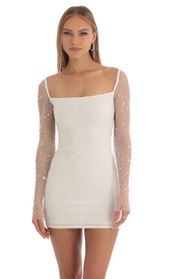 Picture thumb Pauline Sequin Long Sleeve Dress in White. Source: https://media.lucyinthesky.com/data/Mar23/170xAUTO/dabc4bfd-60ff-484e-8de8-68d215777ed4.jpg