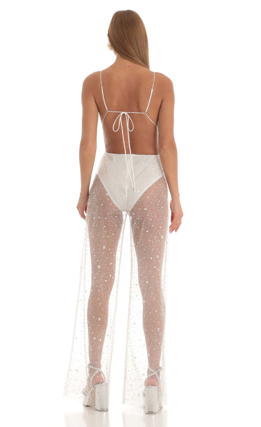 Picture Ceres Sequin Wide Leg Jumpsuit in White. Source: https://media.lucyinthesky.com/data/Mar23/850xAUTO/03289c13-4629-4148-9271-9c9f200a64a5.jpg