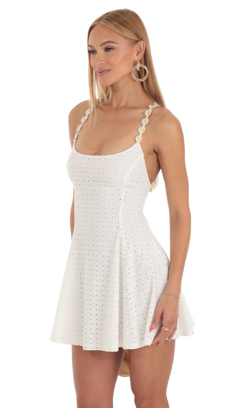 Picture Linnea Eyelet Dress in White Daisy. Source: https://media.lucyinthesky.com/data/Mar23/850xAUTO/0c6aa44e-43c3-47de-936e-f3c471be0142.jpg
