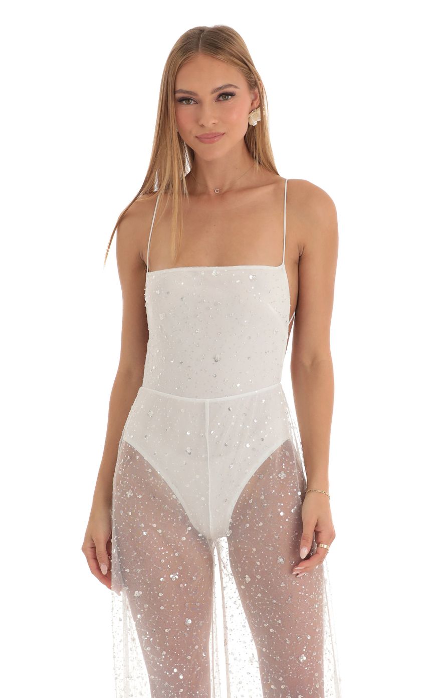 Picture Ceres Sequin Wide Leg Jumpsuit in White. Source: https://media.lucyinthesky.com/data/Mar23/850xAUTO/2a838be7-d477-46fd-97bc-462b7bc62398.jpg