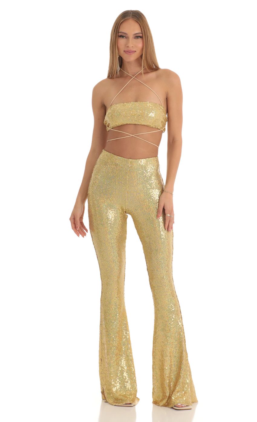 Picture Atlantis Iridescent Sequin Two Piece Pants Set in Gold. Source: https://media.lucyinthesky.com/data/Mar23/850xAUTO/6d0de768-fe2d-4e24-b0d7-509e8a3377f7.jpg