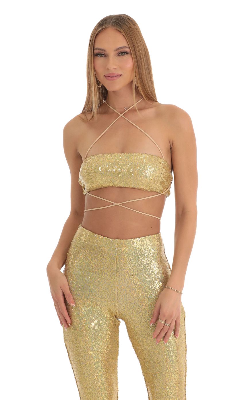 Picture Atlantis Iridescent Sequin Two Piece Pants Set in Gold. Source: https://media.lucyinthesky.com/data/Mar23/850xAUTO/aab5754f-6bed-4326-8a23-3d3174940e69.jpg
