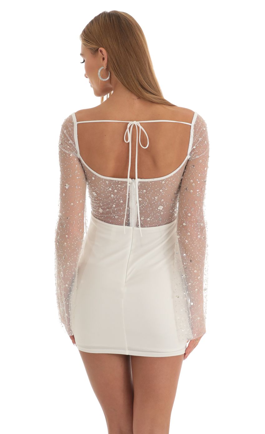 Picture Pauline Sequin Long Sleeve Dress in White. Source: https://media.lucyinthesky.com/data/Mar23/850xAUTO/acacbf61-6302-47e2-94c1-cbdfd2f97067.jpg