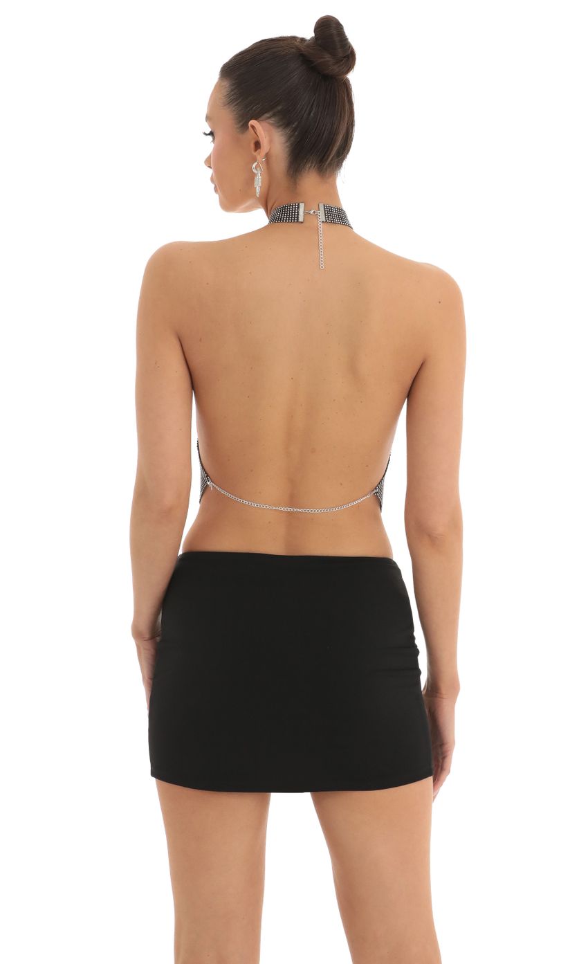 Picture Evie Rhinestone Metallic Two Piece Skirt Set in Black. Source: https://media.lucyinthesky.com/data/Mar23/850xAUTO/eced85e7-10fe-4763-9ea0-1bea10660405.jpg