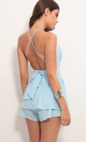 Picture thumb Secret Crush Romper in Sky Blue. Source: https://media.lucyinthesky.com/data/May19_1/170xAUTO/781A7426.JPG