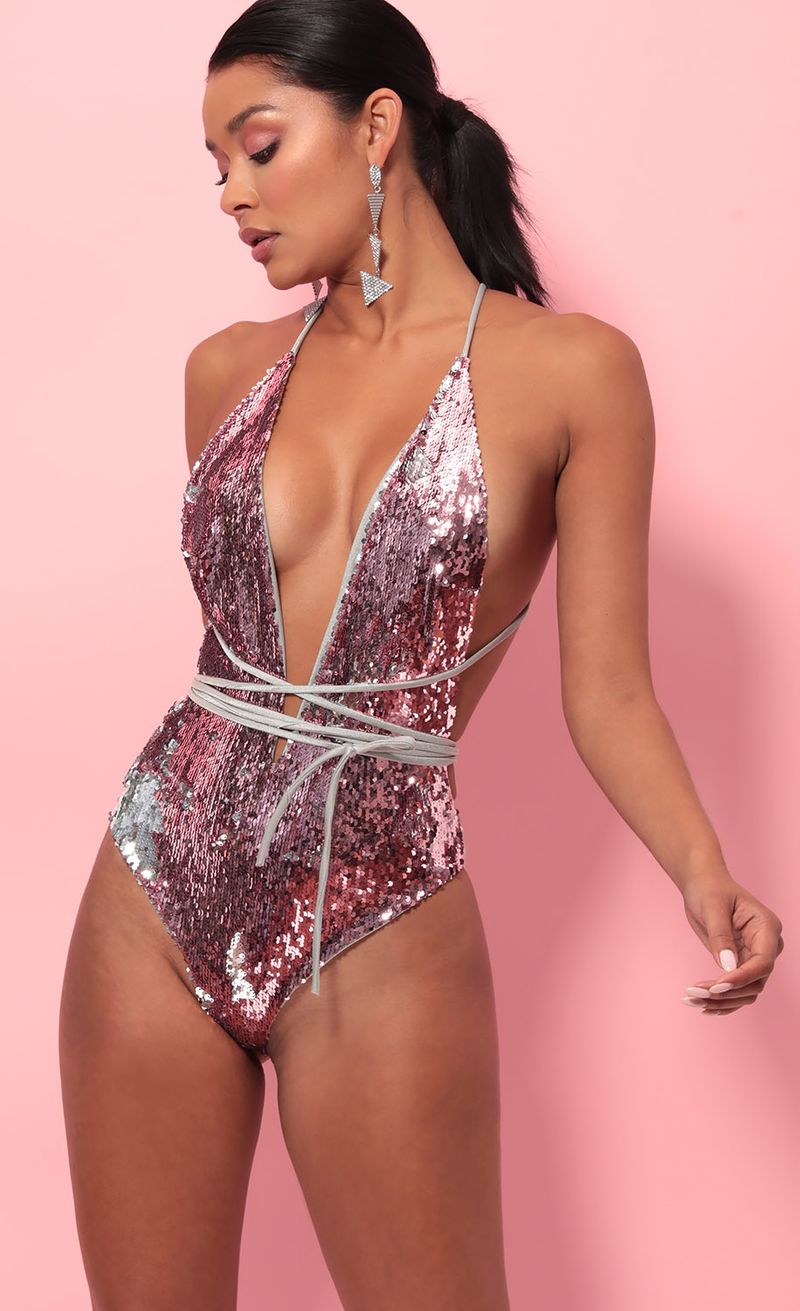 Picture Pacific Plunge Sequin Swimsuit in Mauve Silver. Source: https://media.lucyinthesky.com/data/May19_2/800xAUTO/781A1178FB.JPG