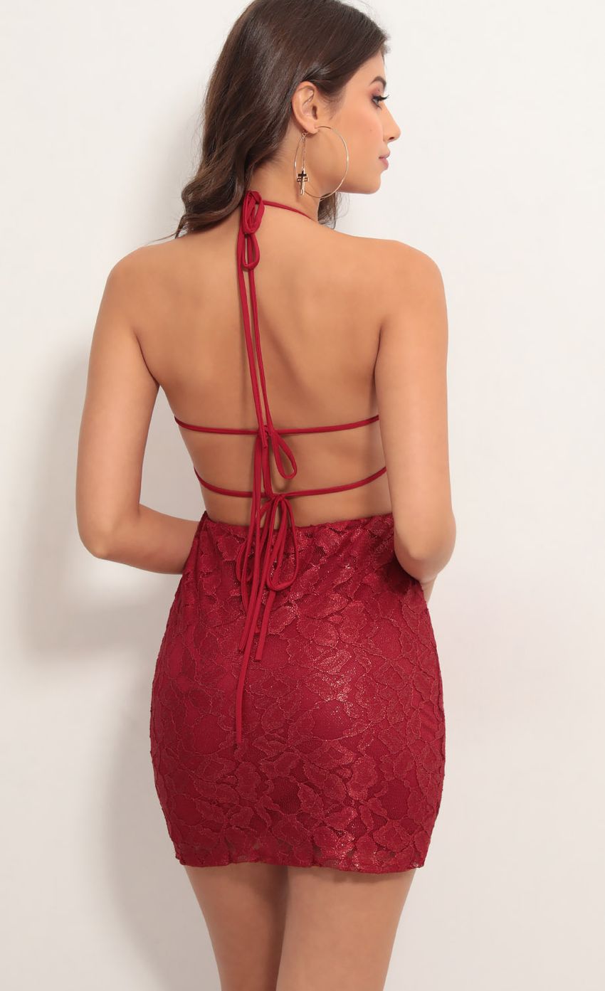 Picture Lustrous Red Lace Dress in Gold Shimmer. Source: https://media.lucyinthesky.com/data/May19_2/850xAUTO/781A5789.JPG