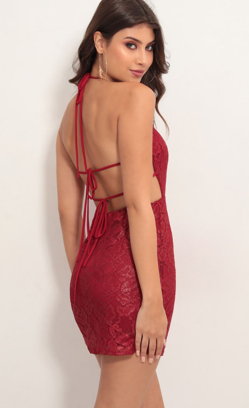 Picture Lustrous Red Lace Dress in Gold Shimmer. Source: https://media.lucyinthesky.com/data/May19_2/850xAUTO/781A5791.JPG