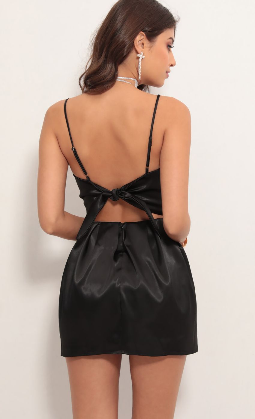 Picture Angeli Pleated Satin Dress in Black. Source: https://media.lucyinthesky.com/data/May19_2/850xAUTO/781A6198.JPG