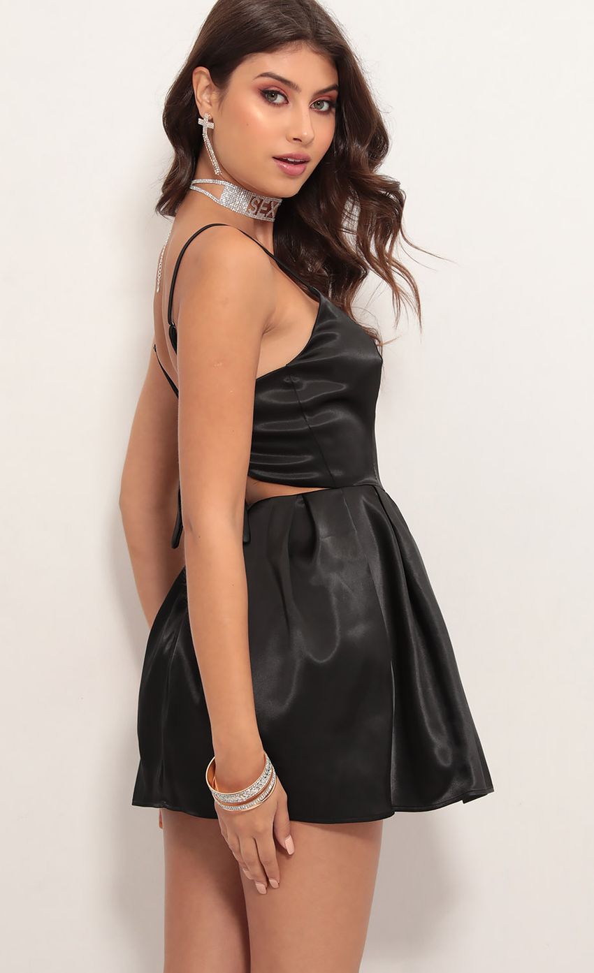 Picture Angeli Pleated Satin Dress in Black. Source: https://media.lucyinthesky.com/data/May19_2/850xAUTO/781A6200.JPG