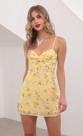 Picture thumb Evelyn Front Twist Chiffon Dress in Yellow Floral. Source: https://media.lucyinthesky.com/data/May20_2/170xAUTO/781A4214.JPG