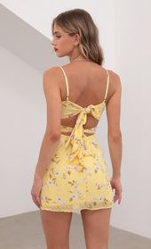 Picture thumb Evelyn Front Twist Chiffon Dress in Yellow Floral. Source: https://media.lucyinthesky.com/data/May20_2/170xAUTO/781A4265.JPG