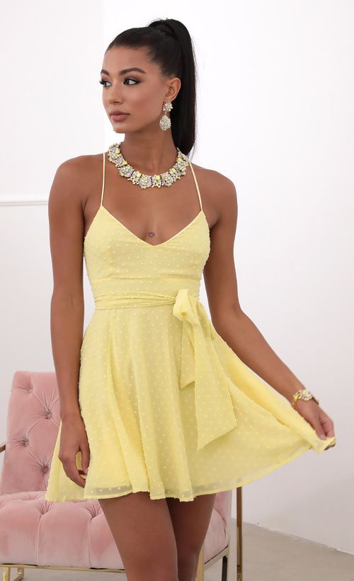 Picture Quinn Tie A-line Dress in Yellow Dots. Source: https://media.lucyinthesky.com/data/May20_2/500xAUTO/781A5498.JPG