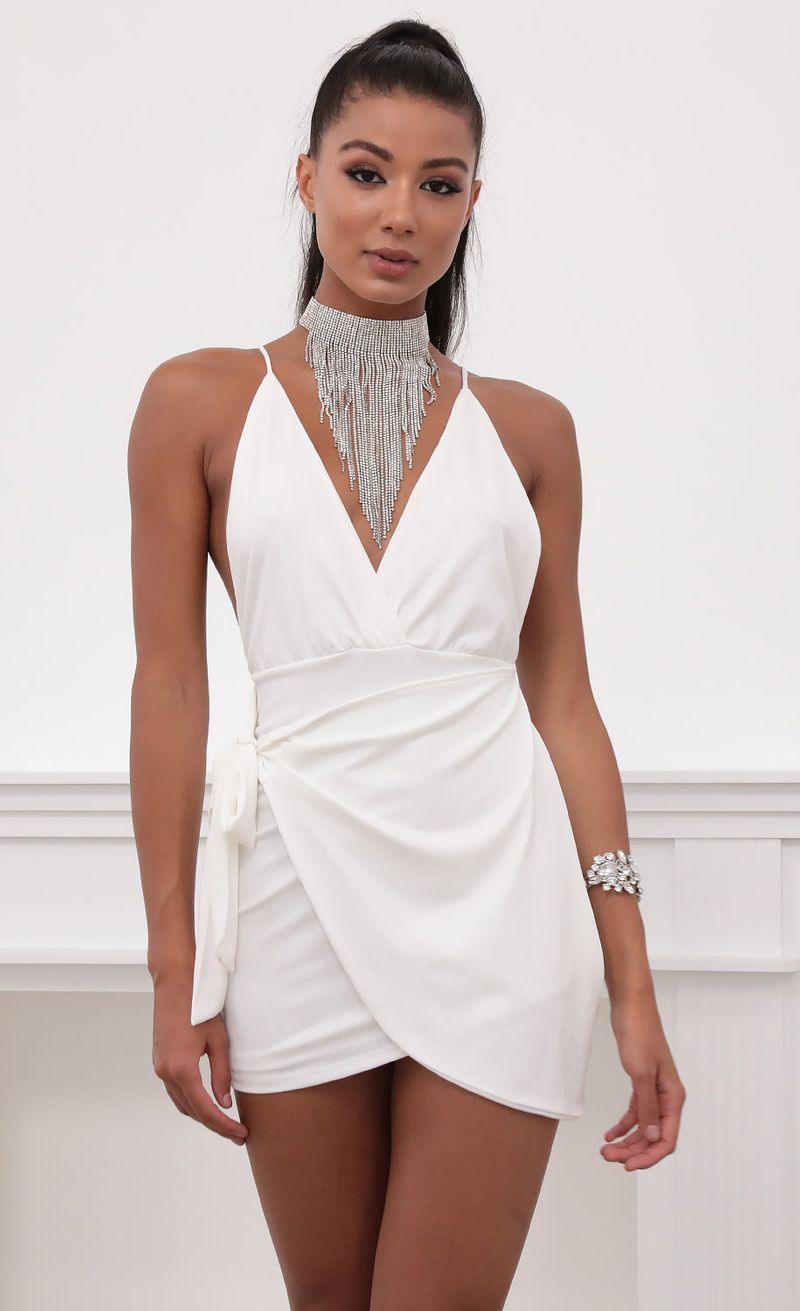 Picture Dani Venezia Wrap Dress in White. Source: https://media.lucyinthesky.com/data/May20_2/800xAUTO/781A6598.JPG