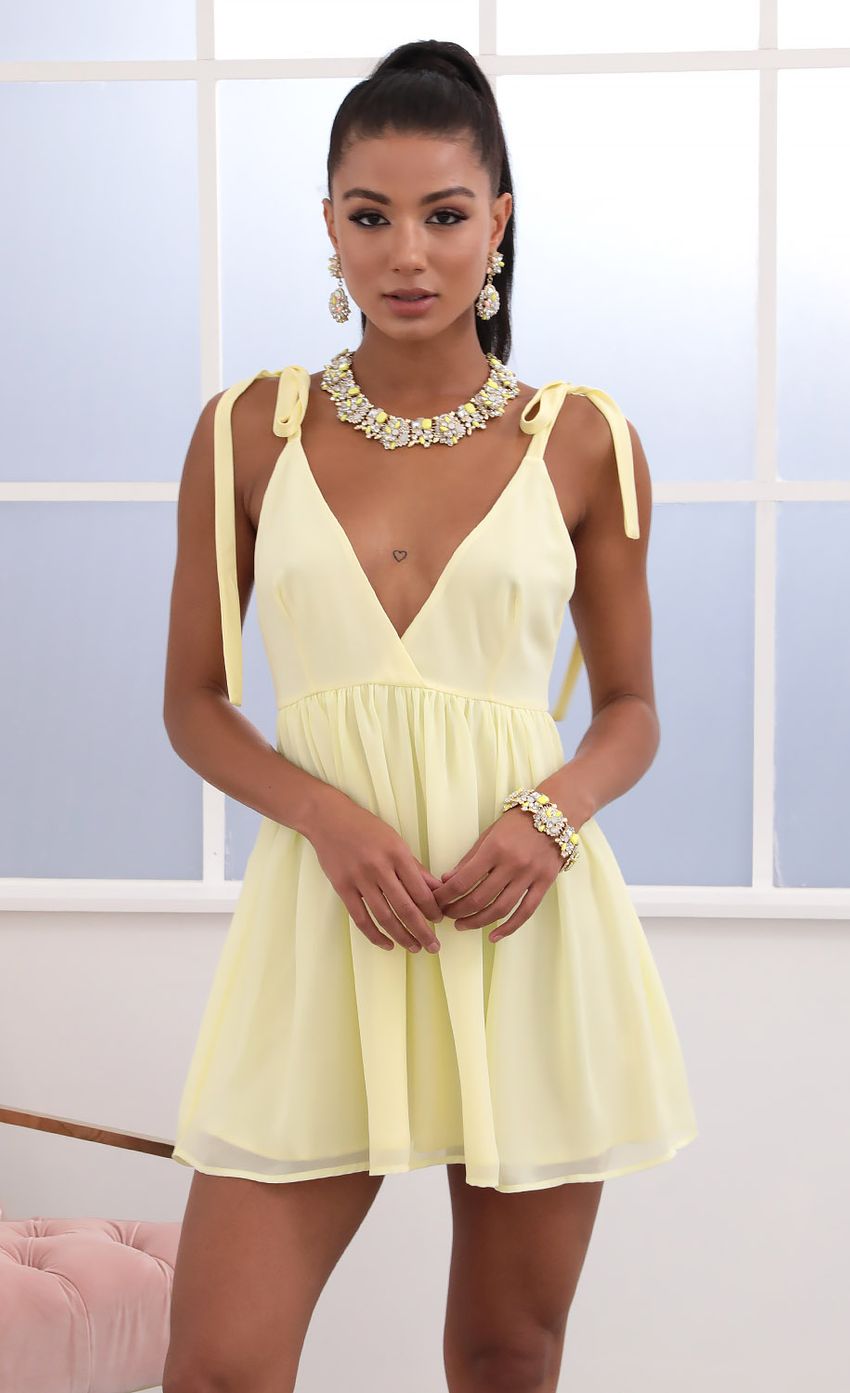 Picture Veronica Ties A-line Dress in Yellow. Source: https://media.lucyinthesky.com/data/May20_2/850xAUTO/781A5215.JPG