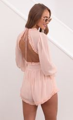 Picture Bettina Ruched Ruffle Romper in Pastel Salmon. Source: https://media.lucyinthesky.com/data/May21_1/150xAUTO/1V9A1403.JPG