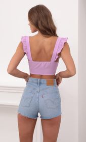 Picture thumb Carolina Ruffle Tie Crop Top in Lavender. Source: https://media.lucyinthesky.com/data/May21_1/170xAUTO/1V9A0525.JPG