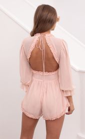 Picture thumb Bettina Ruched Ruffle Romper in Pastel Salmon. Source: https://media.lucyinthesky.com/data/May21_1/170xAUTO/1V9A1395.JPG